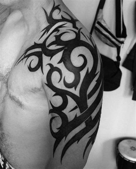 80 Tribal Shoulder Tattoos For Men 2023 Inspiration Guide