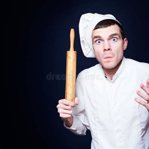 Furious Young Male Cook Holding Rolling Pin Stock Image Image Of Hand Intimidating 269753743