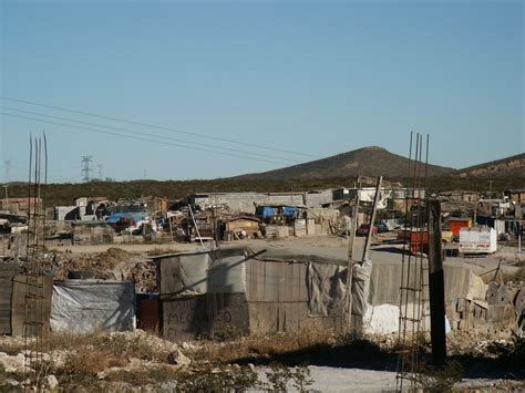 By far britain's largest metropolis, it is also the country's economic, transportation, and cultural center. Ramos Arizpe slums Mexico 2003