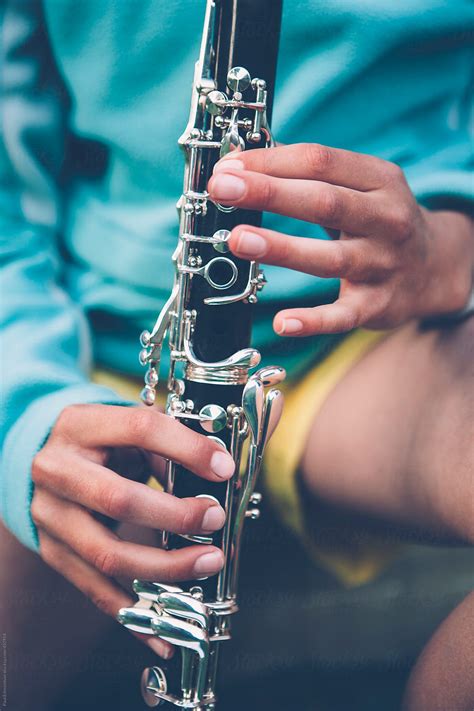 Close Up Of Girl Playing Clarinet By Stocksy Contributor Rialto