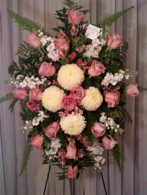 Standing sprays are another popular flower arrangement for funeral services. Fantasy Flowers & More ~ Mauve & Mums Custom Rose and Mum Sympathy Spray - Design is compose ...