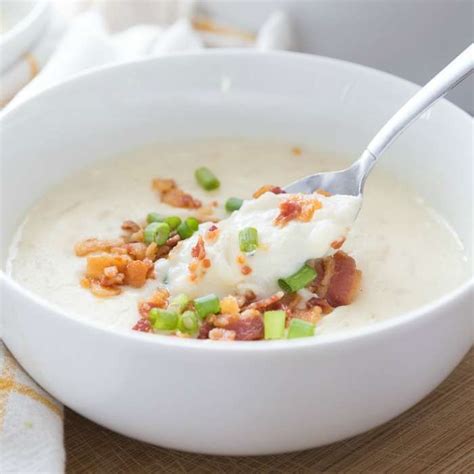 Place bacon, split peas, hash brown potatoes, onion, carrots, celery, garlic, black pepper, red pepper flakes, and chicken broth in a slow cooker; Crock Pot Hash Brown Potato Soup Recipe - Passion For Savings