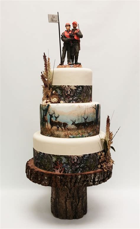 Hunting Theme Wedding Cake With A Hunting Bride And Groom For A Cake