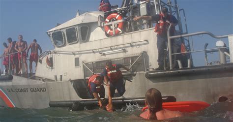Coast Guard Beach Patrol Rescue Person From Rip Current