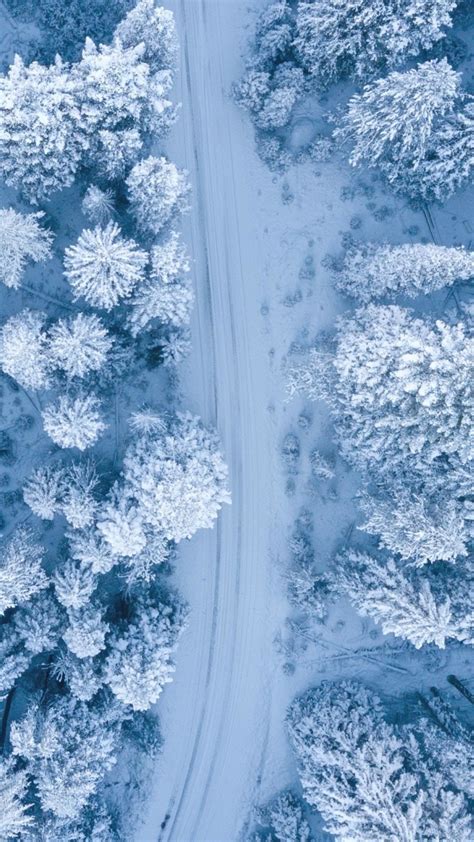 Download 720x1280 Wallpaper Snowfall Winter Aerial View Road Pine