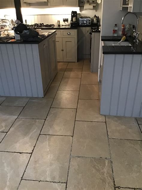 Renovating Polished Limestone Floor With Stained Grout In