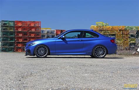 Used 2014 bmw 2 series m235i with tire pressure warning, audio and cruise controls on steering wheel, stability control, auto climate. Turner's Project BMW 228i Estoril Blue gets new upgrades