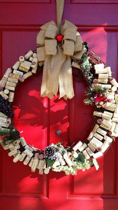 A Wreath Made Out Of Wine Corks On A Red Door