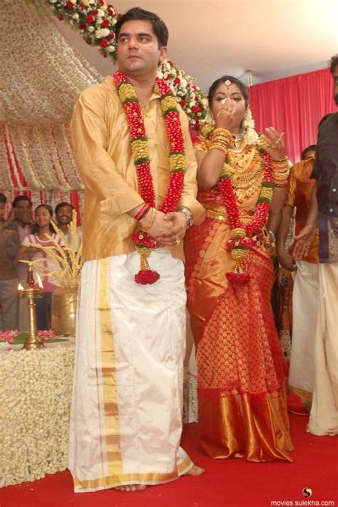 Santosh menon is from kottayam district in kerela and has been working for a mnc in mumbai. navya nair wedding|navya nair wedding album|navya nair ...