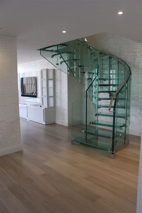 20 Amazing Glass Spiral Staircase Designs