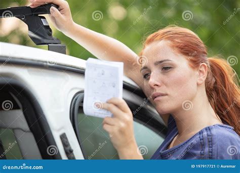 Redhead Woman Installing Roof Rack Stock Image Image Of Females