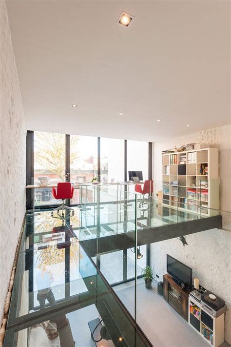 A Living Room Filled With Furniture And Lots Of Glass On Top Of Each