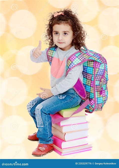 Little Girl Sitting On Stack Of Books Stock Photo Image Of Girl