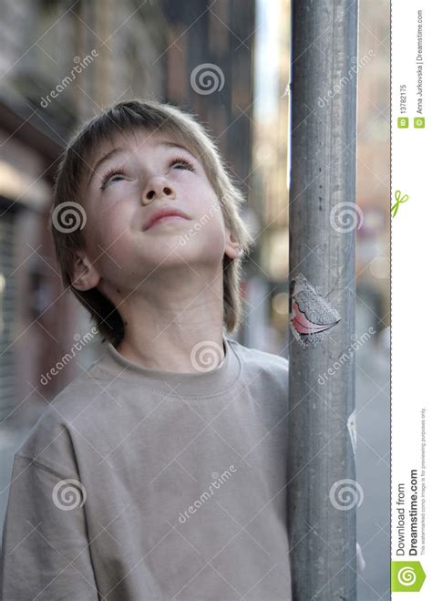 Close Up Portrait Of Beauty Boy Of Looking Up Stock Image