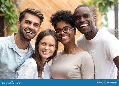 Happy Multiracial Friends Group Bonding Looking At Camera Portrait Stock Image Image Of