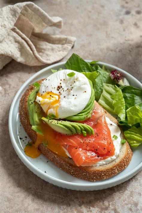 Salmon Avocado And Poached Egg Sandwich Stock Photo Image Of Eating