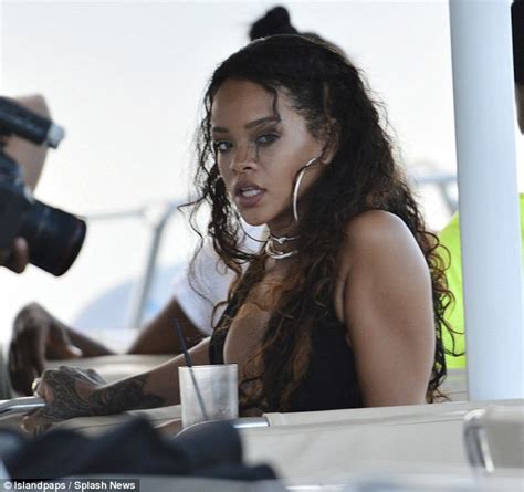 Rihanna Shows Off Her Flawless Figure In A Halter Neck Bikini During A