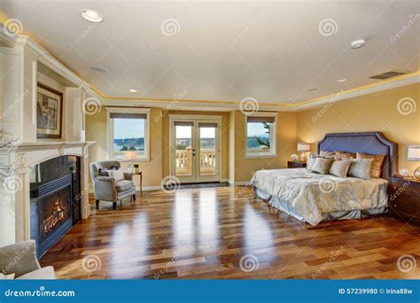 Large Elegant Master Bedroom With Fireplace Stock Photo Image Of