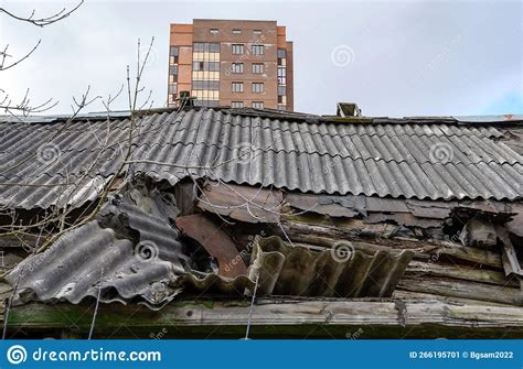 The Roof Of A Partially Destroyed Abandoned Wooden House In The Moscow