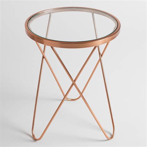The iron base features interlaced linking legs for a chic look that. With a round glass top and a rose gold metal frame, our ...