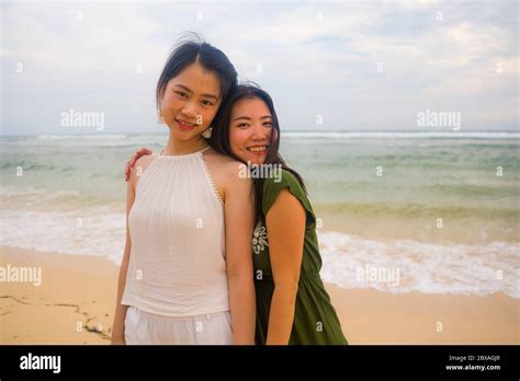 Young Beautiful And Happy Couple Of Attractive Asian Korean Women