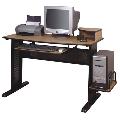 It features an accessory shelf atop a storage cabinet, a keyboard panel equipped with a safety stop, 2 drawers and a file cabinet. Ameriwood Wood & Metal Black & Oak Computer Desk