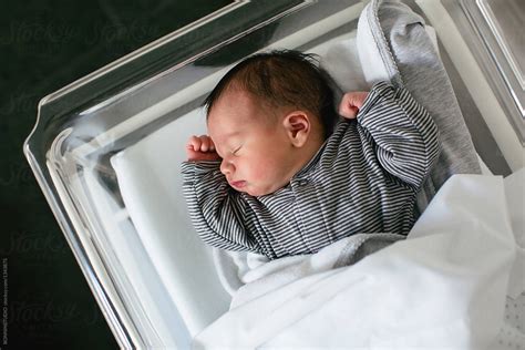 Newborn Baby Boy Sleeping In A Hospital Room By Stocksy Contributor