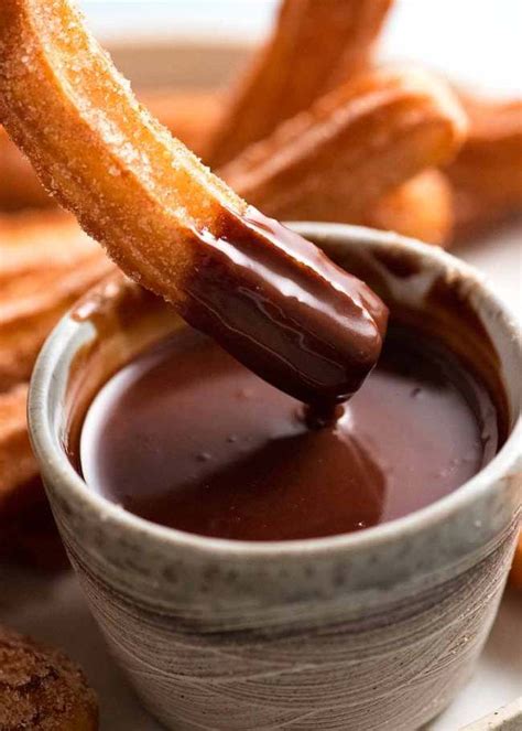 Dipping Churros Into Chocolate Sauce Spanish Churros Recipe Best