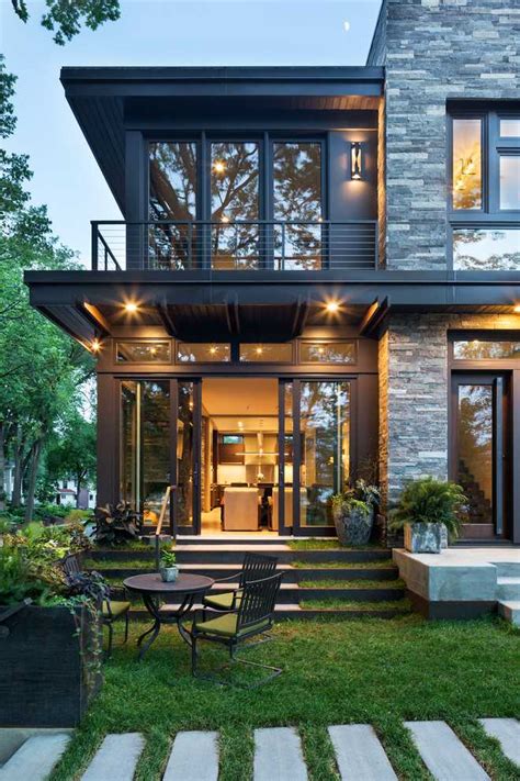 Incredible modern house design with glazed wall style and sleek exterior floor. Modern Organic Home by John Kraemer & Sons in Minneapolis, USA