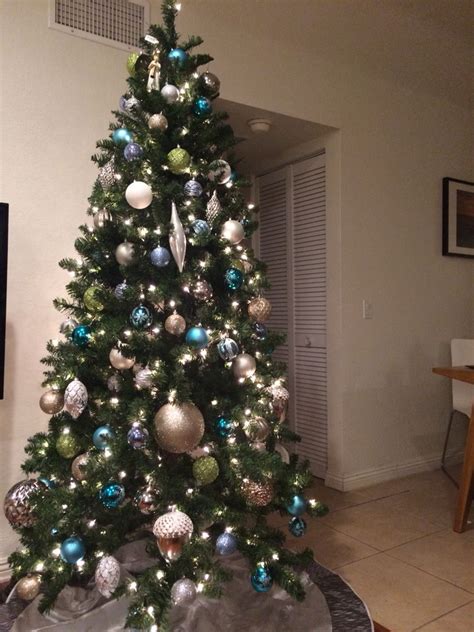 White Christmas Tree With Blue And Silver Decorations