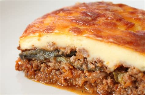 Deliciously tasty and full of flavour, this traditional greek moussaka is made with minced lamb, aubergine and covered in cheese sauce. Classic Greek Moussaka Recipe - Cheap Dinner Ideas