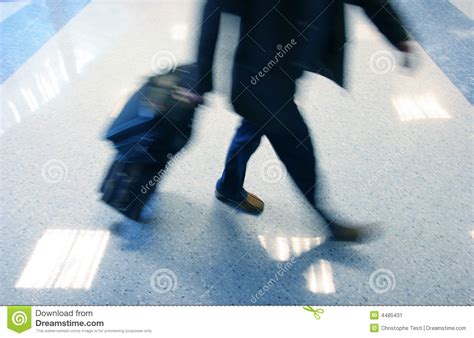 Man Rushing In Ariport To Catch His Flight Stock Image - Image: 4485431