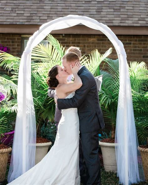 Simple White Tulle Draped Wedding Arch In Lakeland Florida