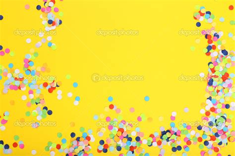 Confetti On Yellow Background — Stock Photo © Belchonock 45090413