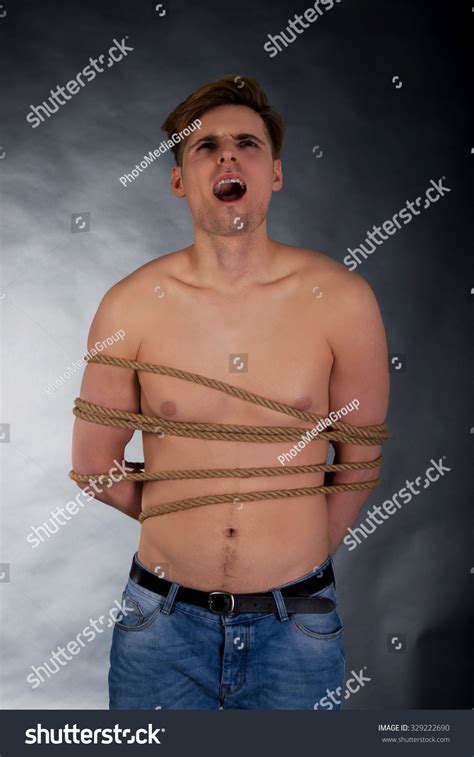 Tortured Shirtless Man Tied Rope Shutterstock