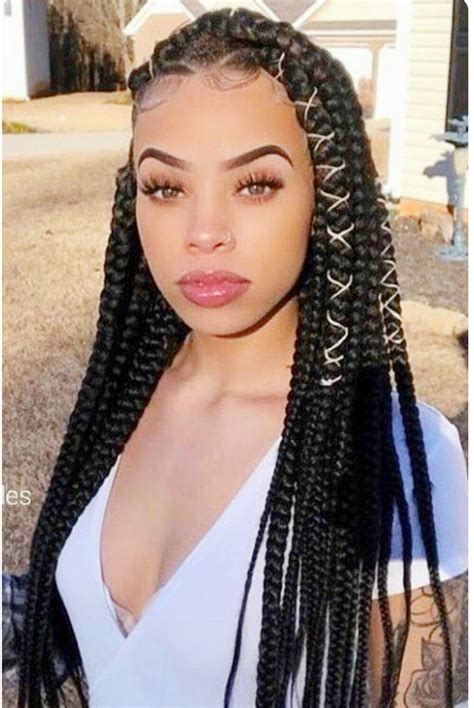 Natural hair refers to black hair that hasn't been chemically altered with straighteners, relaxers or texturizers. Long box braids for African American women. | Box braids ...