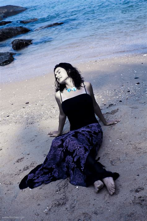 Lady Lying At Beach Footwa