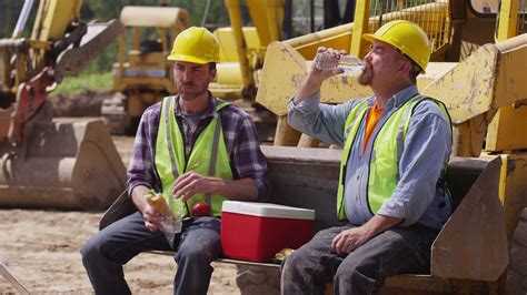 Two Blue Collar Workers Having Lunch On Job Site 3165921 Stock Video At