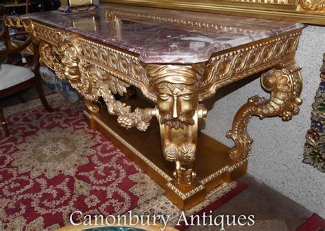 It is completely made of wood. Louis XVI Gilt Console Table and Mirror Set Rococo Carved Gold