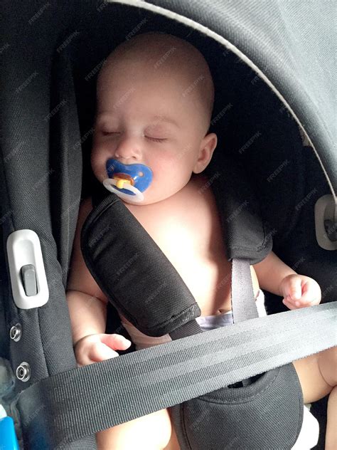Premium Photo Sleeping Baby Boy With Child Pacifier Posing