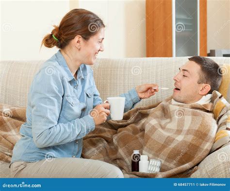 Wife Nursing Sick Husband With Cold Stock Photo CartoonDealer Com