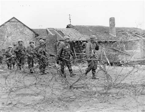 Infantrymen Of The 1st Infantry Division Move Out Of Schneidhausen