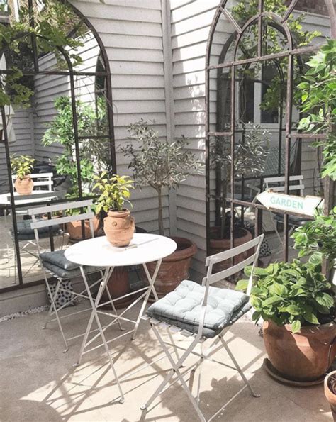 How To Style Small Spaces Courtyard Gardens The Frugality Blog Small