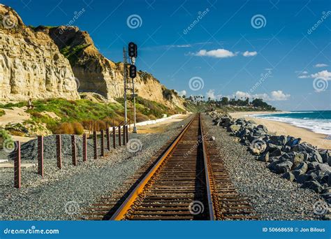 Railroad Tracks Along The Beach Stock Photo Image Of Clouds Beach