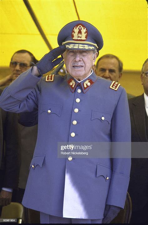 Chilean Leader General Augusto Pinochet In Uniform And Saluting At
