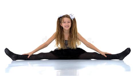 Girl Sitting On Floor With Her Legs Wide Apart Stock Photo Image Of