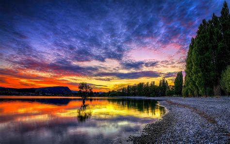 Download 2560x1440 Sunset Sky Clouds Hdr Reflection Lake Trees