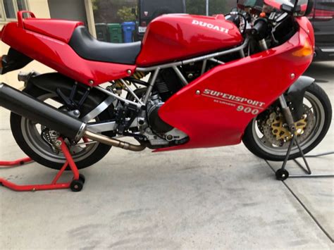 My good friend ducfan has one he owns and loves. 20191208 1995 ducati 900ss-sp right - Rare SportBikes For Sale