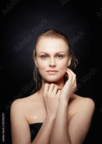 Portrait Of Beautiful Young Blonde Woman With Wet Hair And Natural Make