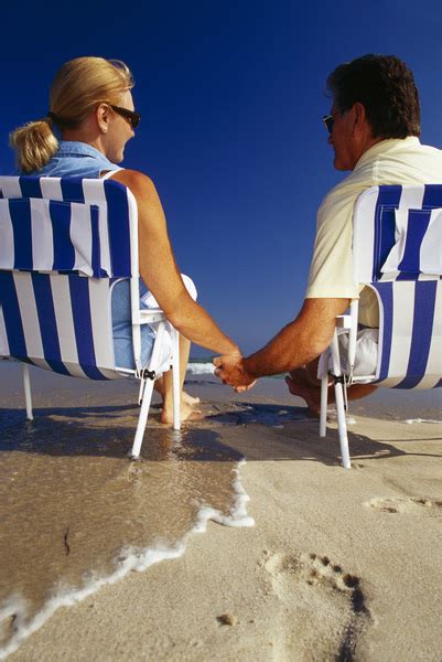 Couple On Beach Holding Hands Free Photo Download Freeimages
